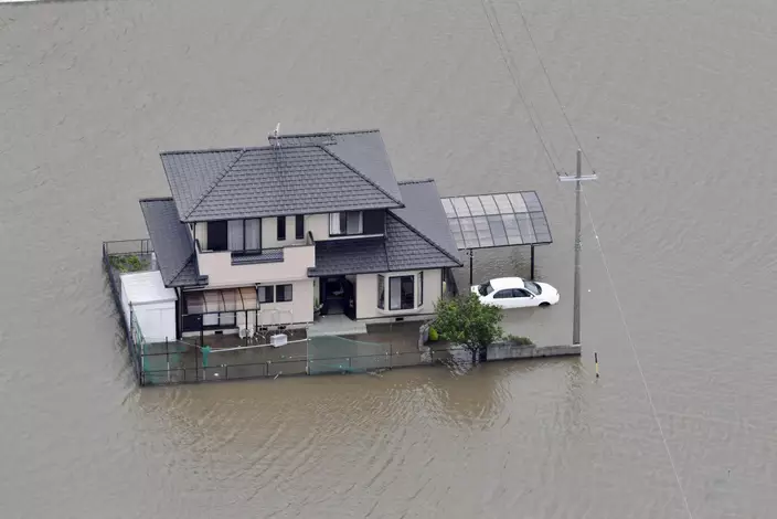 日本持續暴雨造成災害。 美聯社