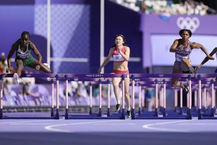 吳艷妮（中）。AP圖片