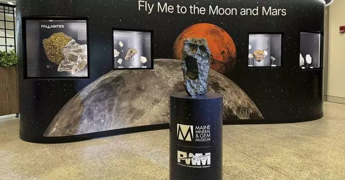 Travelers through Maine’s biggest airport can now fly to the moon. Or at least a chunk of it
