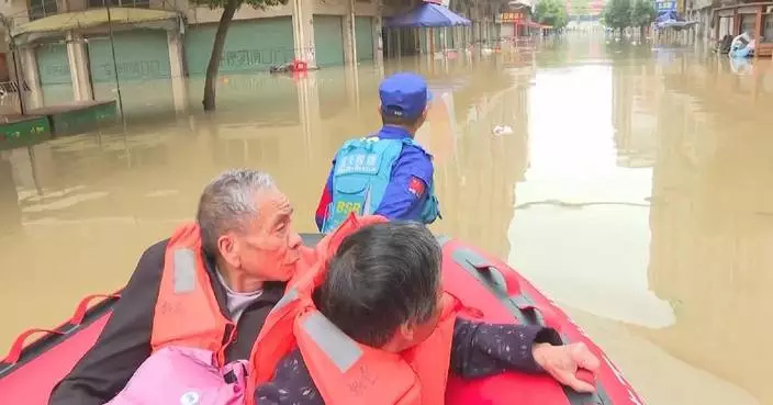 Rescuers search for stranded residents in floods submerging Guangdong neighborhoods