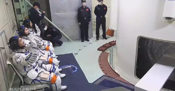 Shenzhou-18 astronauts arrive at launch site, prepare to board spaceship