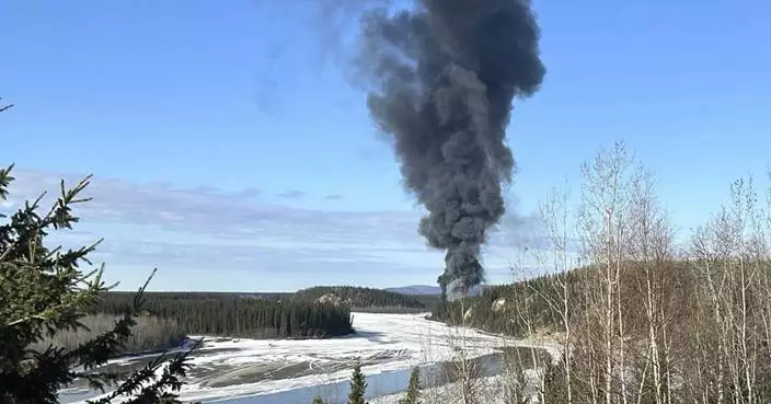 Pilot reported fire on board fuel-laden plane and tried to return to airport before Alaska crash