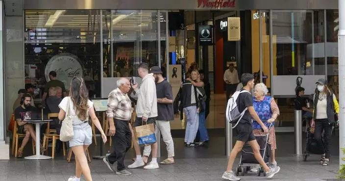 Staff and shoppers return to &#8216;somber&#8217; Sydney shopping mall 6 days after mass stabbings
