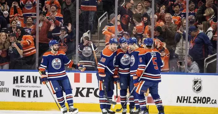 McDavid, Kane help Oilers beat Avalanche 6-2 to clinch playoff berth