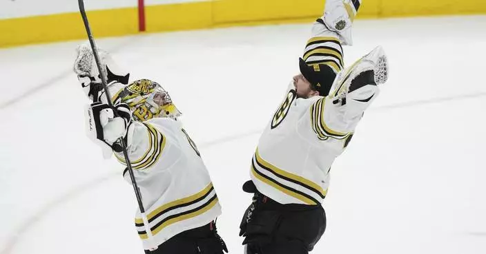 Marchand breaks team playoff goals mark, Bruins beat Maple Leafs 3-1 to move within win of advancing