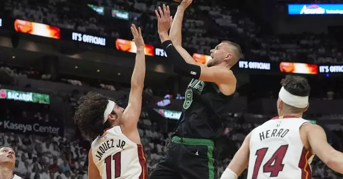 Celtics&#8217; Porzingis leaves playoff game in Miami with right calf tightness