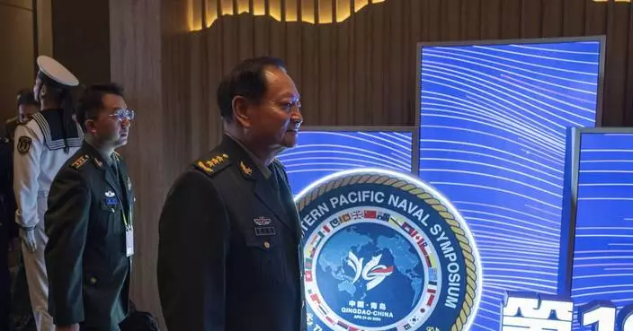 Chinese general takes a harsh line on Taiwan and other disputes at an international naval gathering