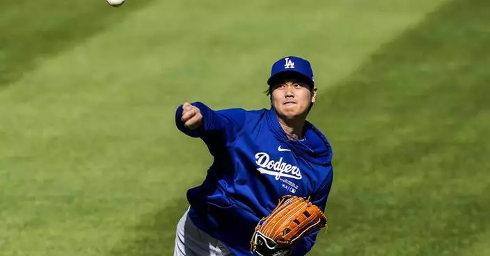Dodgers manager Dave Roberts working with Shohei Ohtani on strike zone discipline