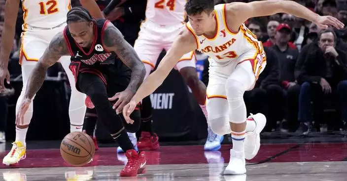 Coby White scores career-high 42 points as Bulls roll past Hawks 131-116 in play-in game