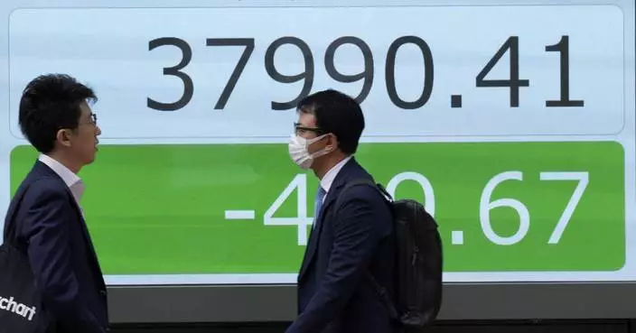 Stock market today:  Asian benchmarks mostly slide as investors focus on earnings