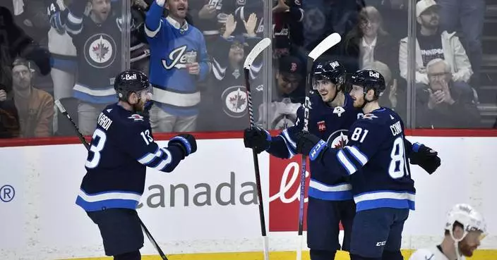 Kyle Connor scores twice as Jets edge Kraken 4-3 to clinch second in the Central Division