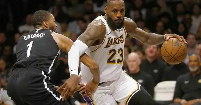 LeBron James ties career high with 9 3-pointers, scores 40 points as Lakers beat Nets 116-104