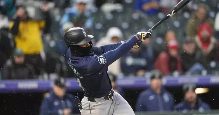 Castillo shuts down Rockies, Raleigh homers as Seattle beats Colorado 7-0 in 33-degree cold