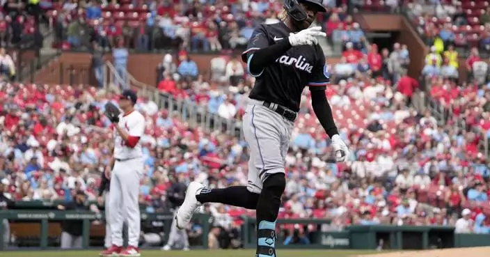 Marlins win first game after 0-9 start, beat Cardinals 10-3 as Chisholm, Gordon hit 3-run homers
