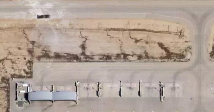 Satellite image analyzed by AP shows damage after Iranian attack on Israeli desert air base
