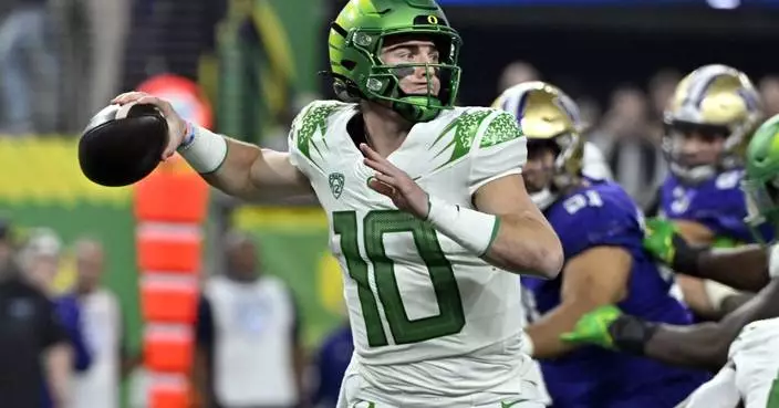 Broncos select former Oregon QB Bo Nix with the 12th pick in the NFL draft