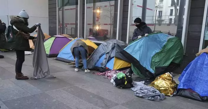 Police clear out a migrant camp in central Paris. Activists say it&#8217;s a pre-Olympics sweep
