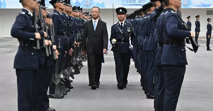 HKMA Chief Executive inspects passing-out parade at HK Police College