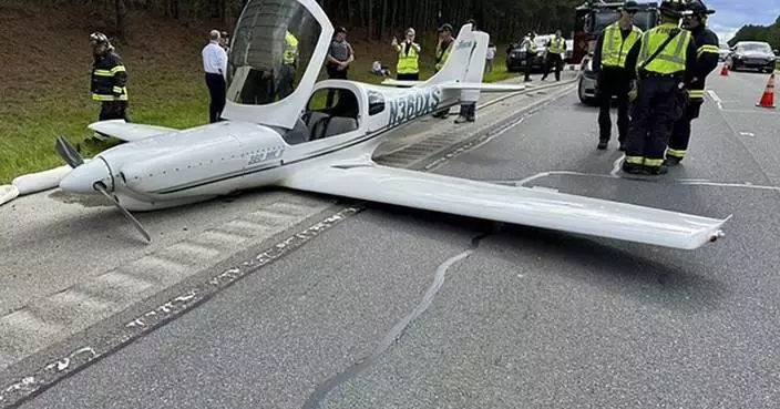Small plane clips 2 vehicles as it lands on North Carolina highway, but no injuries are reported