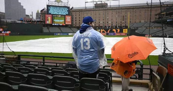 Patient fans wait out 5-hour rain delay for Royals vs. Orioles