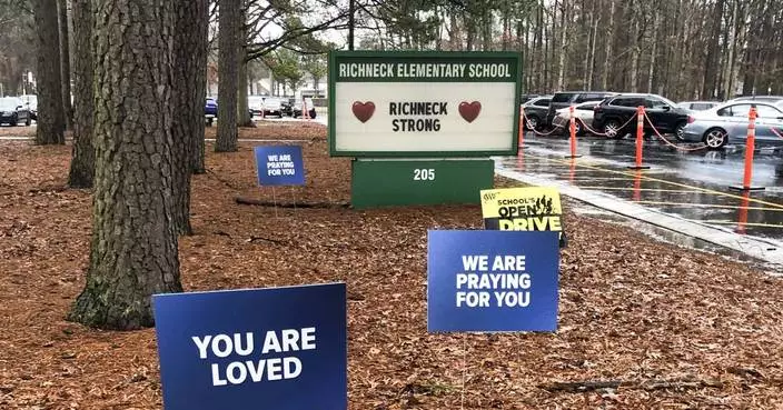 Assistant principal ignored warnings that 6-year-old boy had gun before he shot teacher, report says
