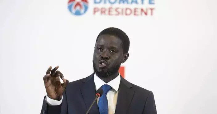 Senegal swears in Africa&#8217;s youngest elected leader as president in a dramatic prison-to-palace rise