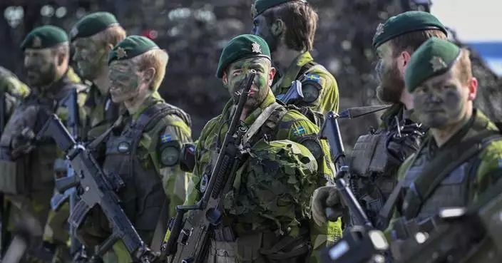 Sweden should spend more on defense and increase the number of conscripts, lawmakers recommend