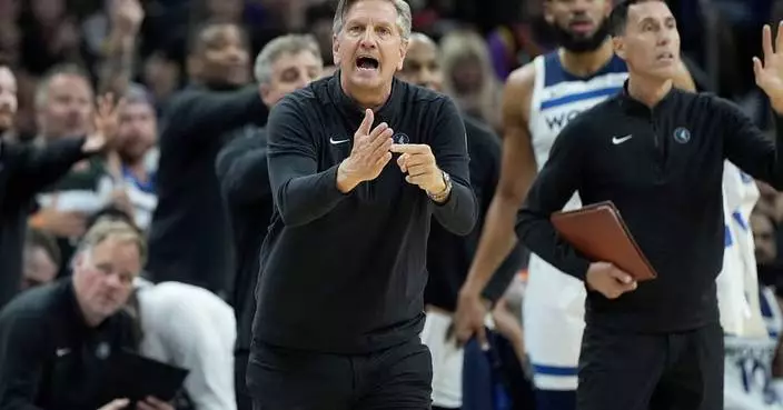 Timberwolves coach Chris Finch has torn patellar tendon in right knee after collision with player
