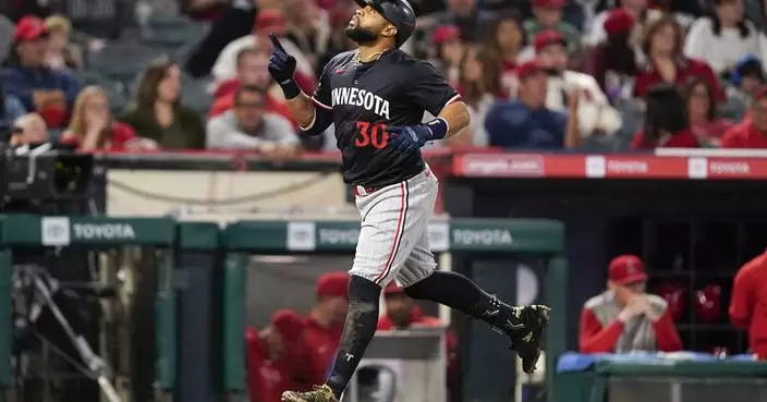 Santana homers again, drives in 4, as Twins rout Angels 16-5