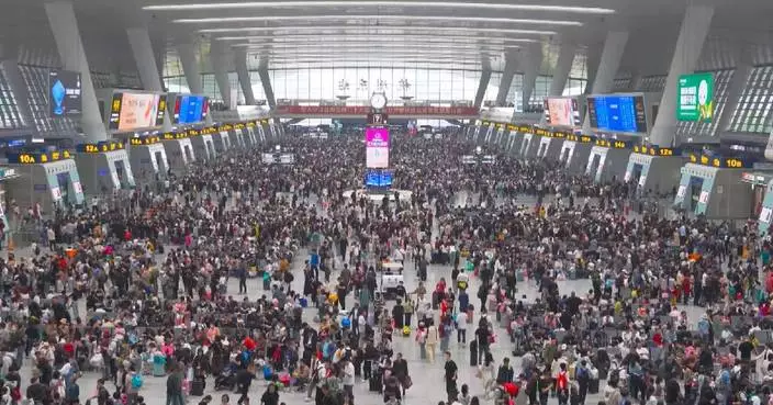China sees passenger trips reach record high on first day of May Day holiday