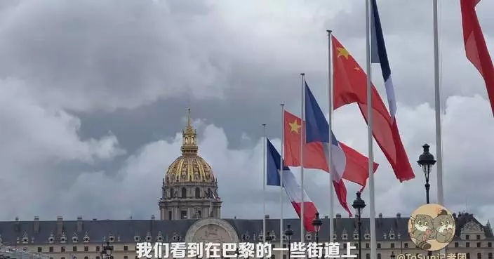 Chinese, French national flags flying on main streets of Paris to welcome President Xi