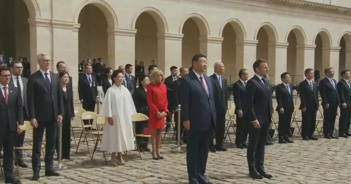 Xi attends welcome ceremony held by Macron