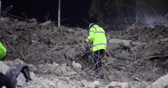 Man rescued from rubble five days after building collapse in South Africa