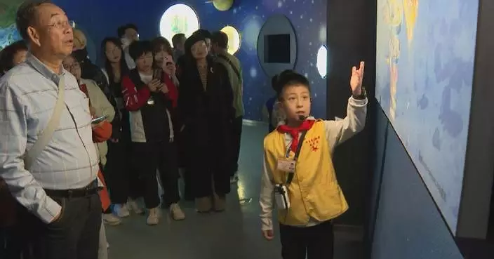 Nine-year-old museum guide wows visitors with knowledge, presentation skills