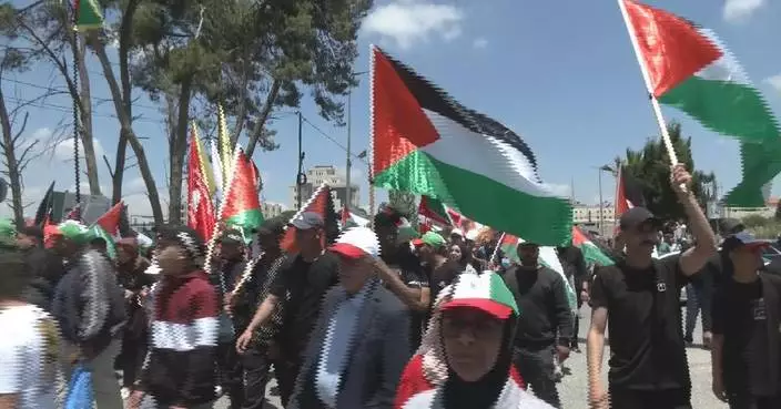 Defiant Palestinians in West Bank commemorate "Nakba" amid intense fighting in Gaza