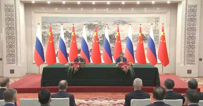 Xi, Putin jointly meet press