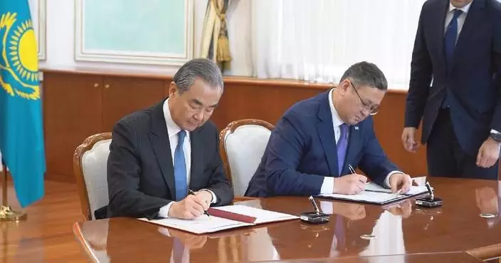 Chinese, Kazakh FMs vow to enhance cooperation