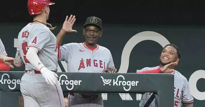 Angels beat Rangers 9-3 to give Ron Washington win in his 1st game as visiting manager in Texas