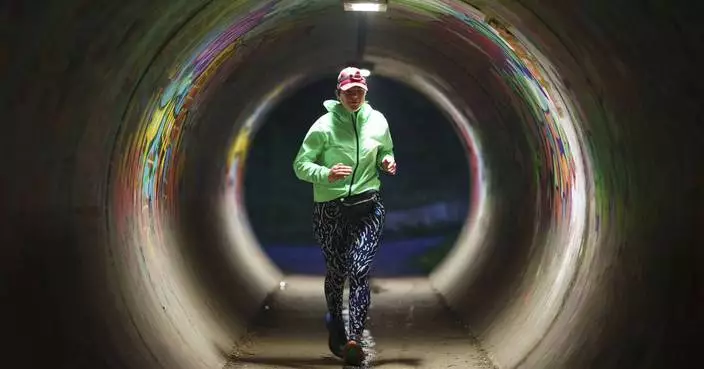 Mother of three uses early morning routine to become a record-breaking runner and inspiration
