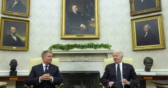 Biden hosts Romanian leader at the White House to celebrate NATO partnership