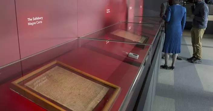 Environmentalists attack a case holding a copy of the Magna Carta in London but document unscathed