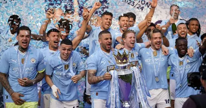 Man City fans party as Guardiola's dominant team wins a record fourth straight Premier League title