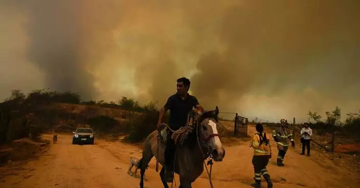 Chile accuses volunteer firefighter and ex-forestry official with causing huge fire that killed 137