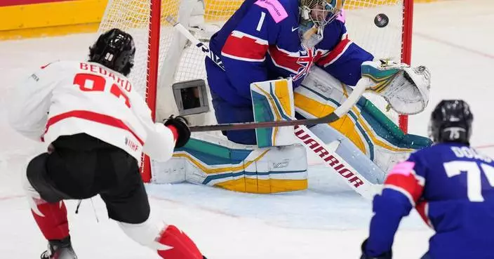 Bedard scores twice as Canada rallies to beat Britain 4-2 at ice hockey worlds
