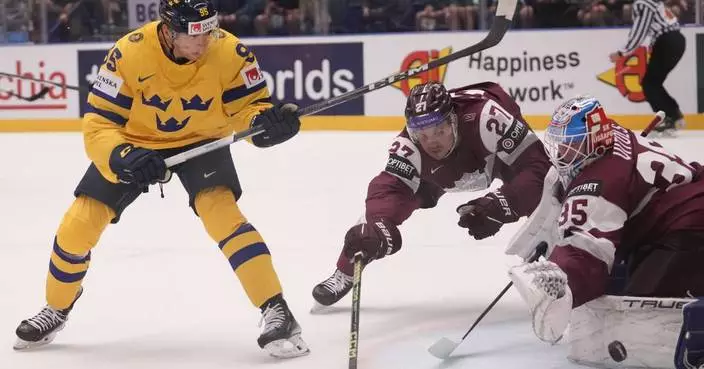 Sweden beats Latvia 7-2, Switzerland routs Denmark 8-0 at men&#8217;s hockey world championship