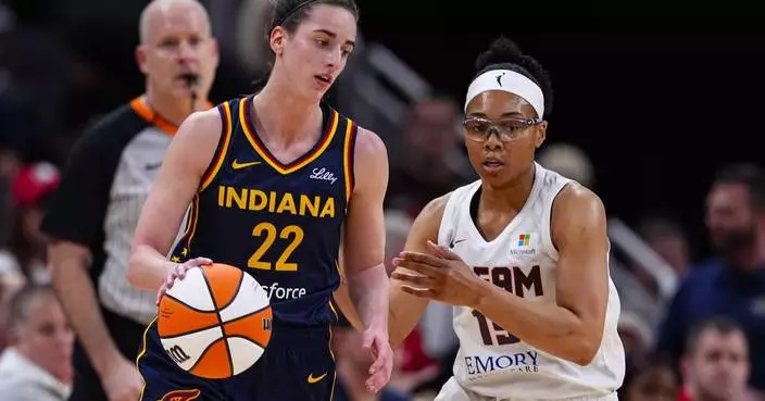 Caitlin Clark struggles early in WNBA debut before scoring 20 points in Fever's loss to Connecticut