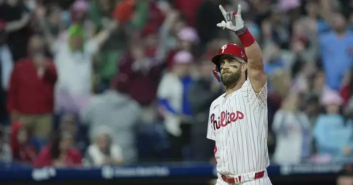 Harper homers and Bohm extends his hitting streak as the streaking Phillies beat the Giants 5-4