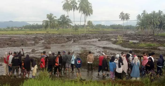 Flash floods and cold lava flow hit Indonesia’s Sumatra island. At least 37 people were killed
