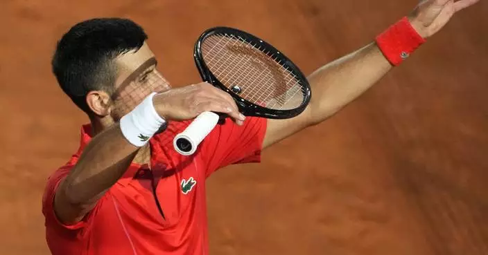 Djokovic says he's 'fine' after being hit on the head by a water bottle