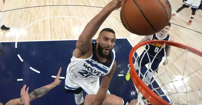 NBA fines Gobert $75,000 for making another money gesture in frustration over a foul call